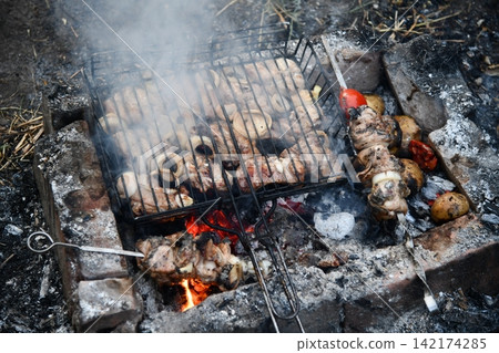 american bbq ribs cooking grill 142174285
