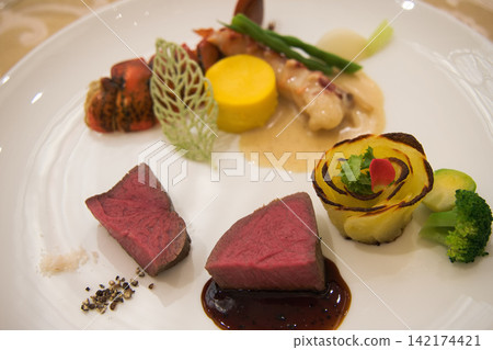 A fine-dinner steak and lobster meal A fine-dinner steak and lobster meal 142174421