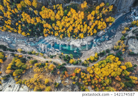 Aerial Autumn Forest and Turquoise Mountain River Landscape Aerial Autumn Forest and Turquoise Mountain River Landscape 142174587