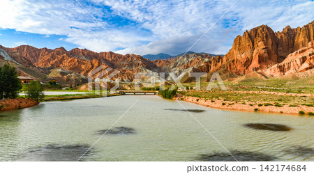 Colorful Canyon Landscape with Lake and Desert Mountains Colorful Canyon Landscape with Lake and Desert Mountains 142174684