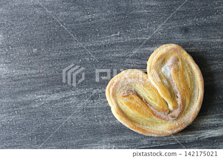 Mexican bakery, sweet bread on vintage gray table: shell, cupcake, bow tie, ear, biscuit with multicolored sprinkles Mexican bakery, sweet bread on vintage gray table: shell, cupcake, bow tie, ear, biscuit with multicolored sprinkles 142175021