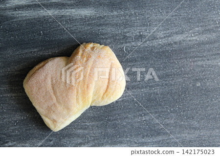 Mexican bakery, sweet bread on vintage gray table: shell, cupcake, bow tie, ear, biscuit with multicolored sprinkles Mexican bakery, sweet bread on vintage gray table: shell, cupcake, bow tie, ear, biscuit with multicolored sprinkles 142175023