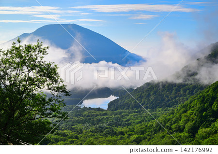 View from Kinsei Pass: Mount Nantai, Lake Yunoko, and a sea of clouds. View from Kinsei Pass: Mount Nantai, Lake Yunoko, and a sea of clouds. 142176992