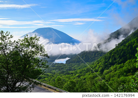 View from Kinsei Pass: Mount Nantai, Lake Yunoko, and a sea of clouds. View from Kinsei Pass: Mount Nantai, Lake Yunoko, and a sea of clouds. 142176994