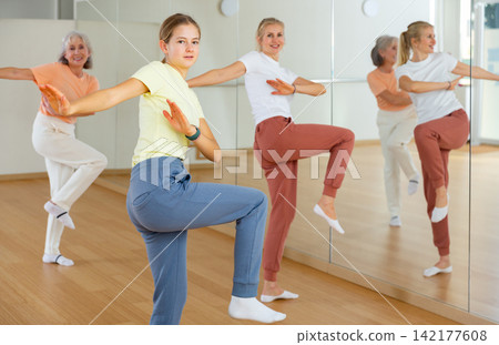 Group of women dancing modern dance Group of women dancing modern dance 142177608