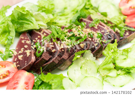 Seared bonito and salad (ginger, green onions, tomatoes, cucumbers, lettuce) Seared bonito and salad (ginger, green onions, tomatoes, cucumbers, lettuce) 142178102