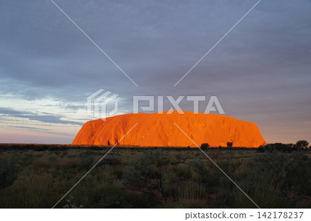 Uluru sunset view, from the Uluru sunset viewing area, Australia Uluru sunset view, from the Uluru sunset viewing area, Australia 142178237