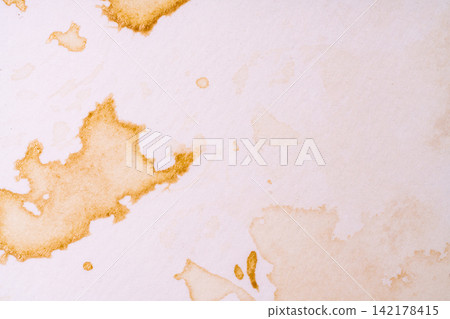 A photograph showing the dirt and grime of everyday life through brown stains. A photograph showing the dirt and grime of everyday life through brown stains. 142178415