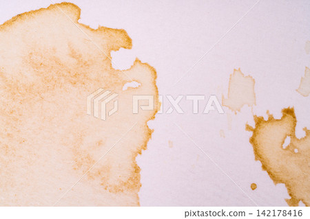 A photograph showing the dirt and grime of everyday life through brown stains. A photograph showing the dirt and grime of everyday life through brown stains. 142178416