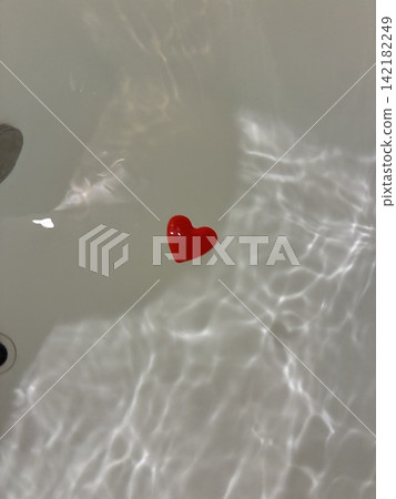 Floating heart Floating heart 142182249