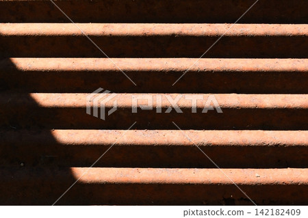 old zinc metal roof background with sunlight, construction industry old zinc metal roof background with sunlight, construction industry 142182409