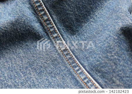 seam of blue denim texture background, jean fashion style seam of blue denim texture background, jean fashion style 142182423