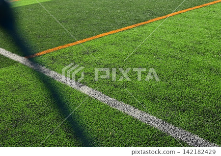 artificial green grass background for playground artificial green grass background for playground 142182429