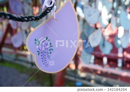 Tsushima Shrine: Ema (votive tablet) with wisteria petals Tsushima Shrine: Ema (votive tablet) with wisteria petals 142184204