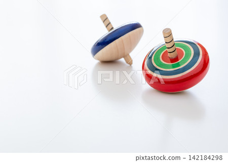 Spinning top, white background Spinning top, white background 142184298