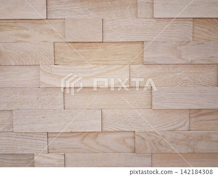 Structural wood wall for decor modern building consists of small bricks. Natural background for interior or exterior. Structural wood wall for decor modern building consists of small bricks. Natural background for interior or exterior. 142184308
