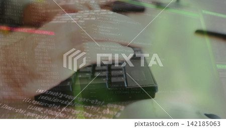 Typing single adult hand moving across compact external numeric keypad at desk, with code overlay Typing single adult hand moving across compact external numeric keypad at desk, with code overlay 142185063
