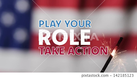 Displaying centered bold slogan on banner, blurred US flag and lower-right sparkler emitting sparks. Patriotic, poster, digital, typography, advertising, tricolor, bokeh 142185123