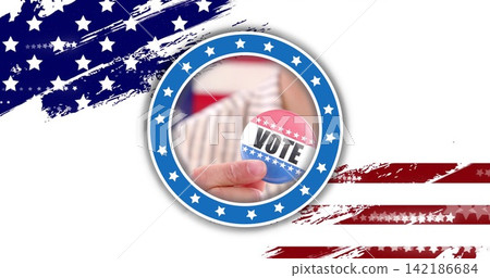 Pinching hand holding round VOTE button on white canvas, showing blue star-ring and striped shirt Pinching hand holding round VOTE button on white canvas, showing blue star-ring and striped shirt 142186684