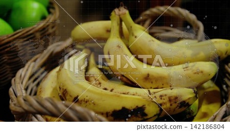 Showing ripe yellow bananas in woven baskets at market with green apples, map and code overlay 142186804