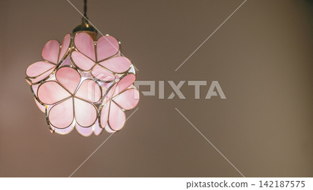 Pink pendant light with a cherry blossom motif 142187575