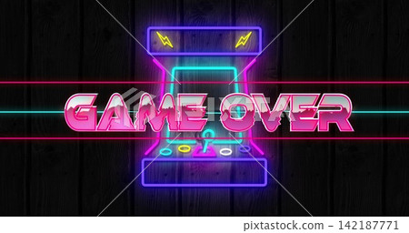 Displaying neon arcade cabinet glowing on dark wood wall, with GAME OVER sign, joystick, buttons Displaying neon arcade cabinet glowing on dark wood wall, with GAME OVER sign, joystick, buttons 142187771