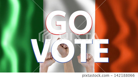 Showing bold poster featuring GO VOTE on green white orange flag with three raised clenched fists 142188066