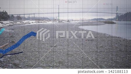 Displaying pebble beach stretching toward suspension bridge over calm bay, showing grid overlay Displaying pebble beach stretching toward suspension bridge over calm bay, showing grid overlay 142188113