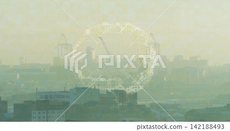 Glowing circular digital network overlay hovering over hazy harbor skyline with cranes ships stacks Glowing circular digital network overlay hovering over hazy harbor skyline with cranes ships stacks 142188493
