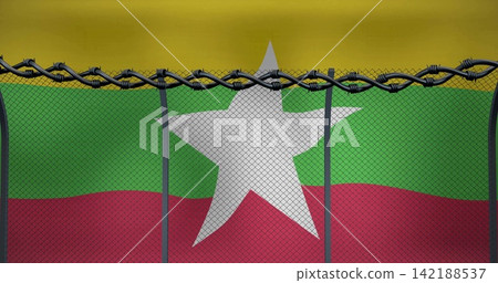 Framing white star behind chainlink mesh at fence line, with tricolor flag, razor wire, posts Framing white star behind chainlink mesh at fence line, with tricolor flag, razor wire, posts 142188537