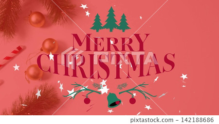 Showing large MERRY CHRISTMAS text centered on coral-red card, featuring pine branches and baubles 142188686