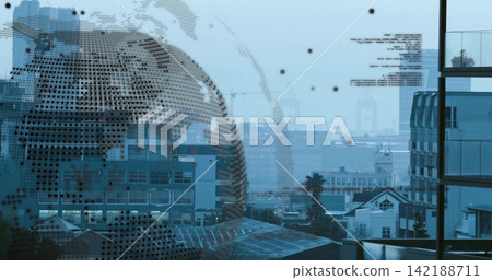 Framing decorative dotted globe decal filling center of glass window, revealing hazy harbor cranes Framing decorative dotted globe decal filling center of glass window, revealing hazy harbor cranes 142188711