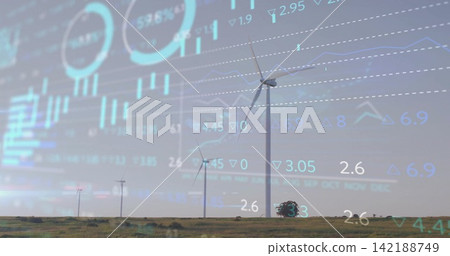 Dominating wind turbine showing data overlay across sky on rural plain with turbines and small tree Dominating wind turbine showing data overlay across sky on rural plain with turbines and small tree 142188749