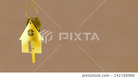 Hanging gold house-shaped keychain with round window rectangular slot and key in studio, copy space 142188966