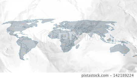 Showing stylized world map on crumpled sheet on table, displaying orange markers and dotted points 142189224