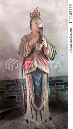 Yuan Dynasty painted clay musician statues in Jinci Temple, Taiyuan, Shanxi, China Yuan Dynasty painted clay musician statues in Jinci Temple, Taiyuan, Shanxi, China 142189589