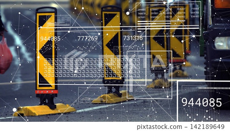 Showing front yellow chevron bollard mounted on rubber base guiding wet roadway, with digital data Showing front yellow chevron bollard mounted on rubber base guiding wet roadway, with digital data 142189649