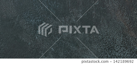 Dark gray concrete wall texture background with rough mottled surface pattern Dark gray concrete wall texture background with rough mottled surface pattern 142189692