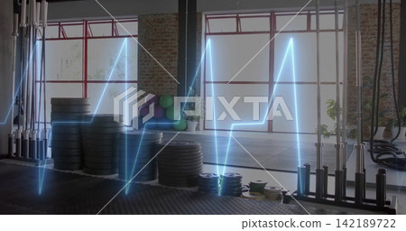 Displaying stacked weight plates and bumper plates at gym center, with neon-blue waveform overlay Displaying stacked weight plates and bumper plates at gym center, with neon-blue waveform overlay 142189722