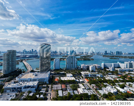 Aerial South beach landscape. Luxury Miami architecture. Miami residential neighborhood. Aerial residential landscape. Florida residential neighborhood. Hotel rental architecture. Luxury vacation Aerial South beach landscape. Luxury Miami architecture. Miami residential neighborhood. Aerial residential landscape. Florida residential neighborhood. Hotel rental architecture. Luxury vacation 142190395