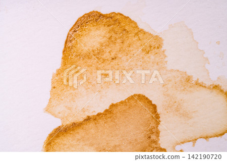 A photograph that conveys hygiene through brown stains remaining on a white background. A photograph that conveys hygiene through brown stains remaining on a white background. 142190720
