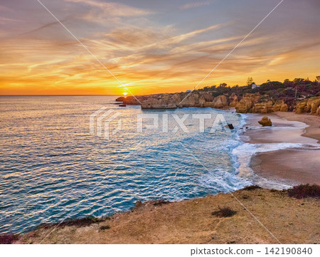 Sunset Coastline at Praia de Sao Rafael Beach in Algarve Sunset Coastline at Praia de Sao Rafael Beach in Algarve 142190840
