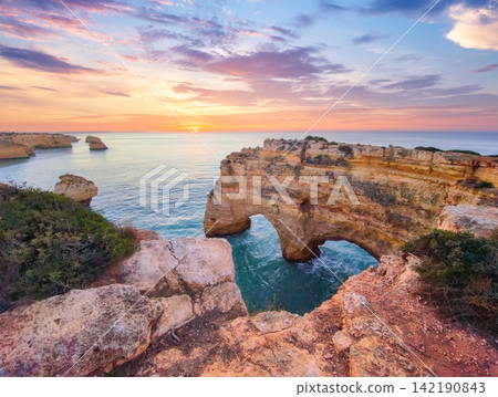 Praia da Marinha beach natural ocean cliffs and sea stacks Algarve Portugal Praia da Marinha beach natural ocean cliffs and sea stacks Algarve Portugal 142190843