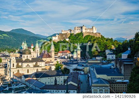 Salzburg Cathedral and Hohensalzburg Fortress in Afternoon Sun Salzburg Cathedral and Hohensalzburg Fortress in Afternoon Sun 142190926