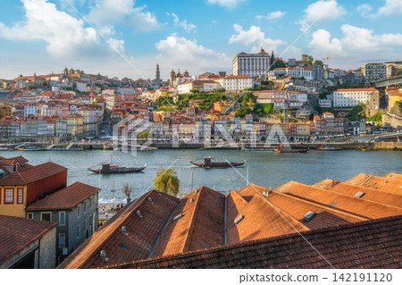Porto Ribeira Portugal elevated view over Douro River roofs and boats Porto Ribeira Portugal elevated view over Douro River roofs and boats 142191120
