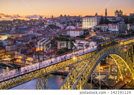 Porto tram at twilight on illuminated Luis I Bridge over Douro River Porto tram at twilight on illuminated Luis I Bridge over Douro River 142191129