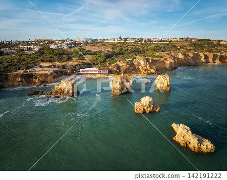 Aerial View of Praia dos Arrifes Sea Stacks in Algarve Aerial View of Praia dos Arrifes Sea Stacks in Algarve 142191222