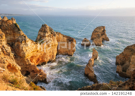 Ponte da Piedade morning cliffs and sea stacks in Lagos, Algarve 142191248