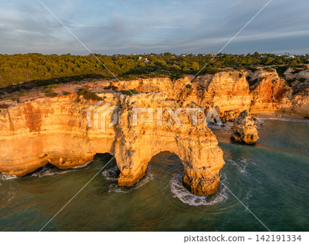 Drone View of Praia da Marinha Cliffs and Sea Arches Drone View of Praia da Marinha Cliffs and Sea Arches 142191334