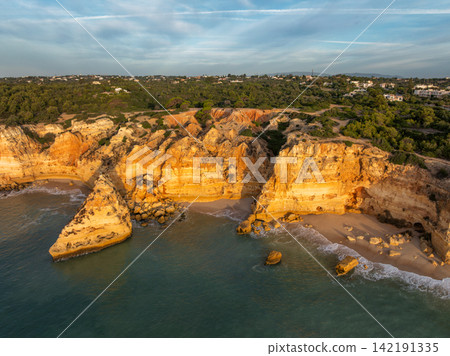 Drone View of Praia da Marinha Cliffs and Sea Arches 142191335